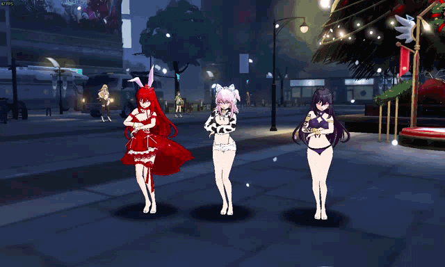 three anime girls dancing in front of a christmas tree in a video game