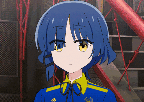 a girl with blue hair is wearing a blue and yellow shirt with the word cabj on it