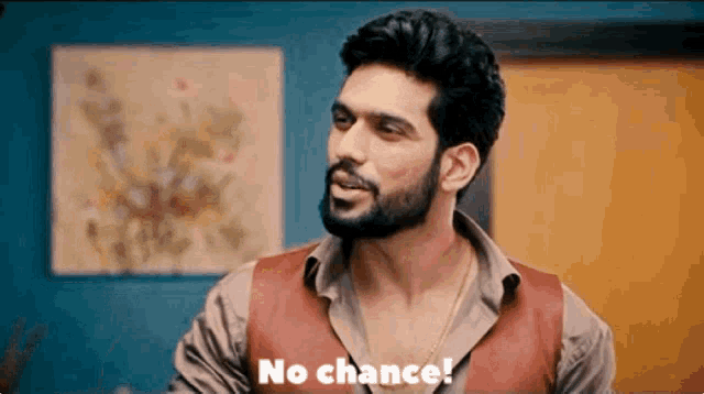 a man with a beard says " no chance "