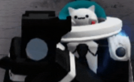 a robot with a cat on top of it 's head