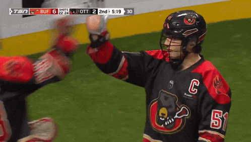 a hockey player wearing the number 51 jersey