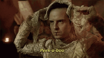 a man is wearing a white dress and a hat and says `` peek - a-boo '' .