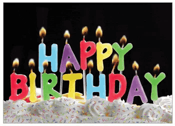 a cake with candles that say happy birthday