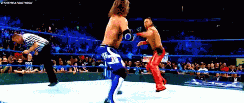 Shinsuke Nakamura Punch GIF - Shinsuke Nakamura Punch Aj Styles GIFs