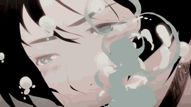 a close up of a person with bubbles coming out of their mouth