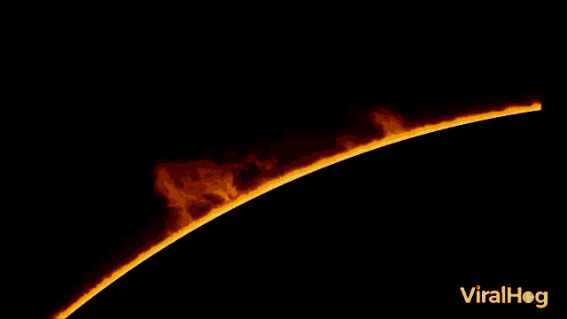a close up of the sun 's rays coming out of the earth