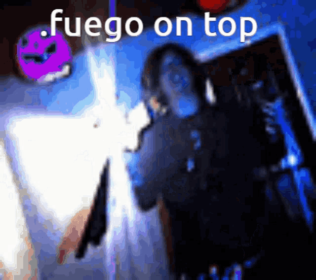 a blurry picture of a person with the words fuego on top in the corner