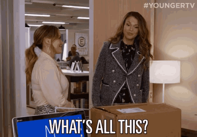 two women are standing next to each other and one of them is asking what 's all this ..