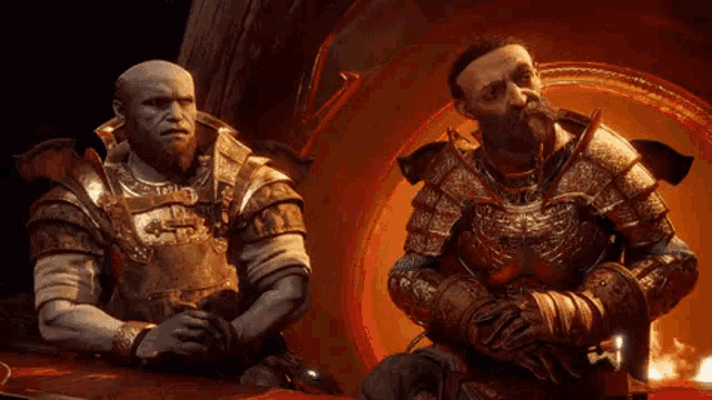 two men in armor are sitting next to each other in front of a fire in a video game .