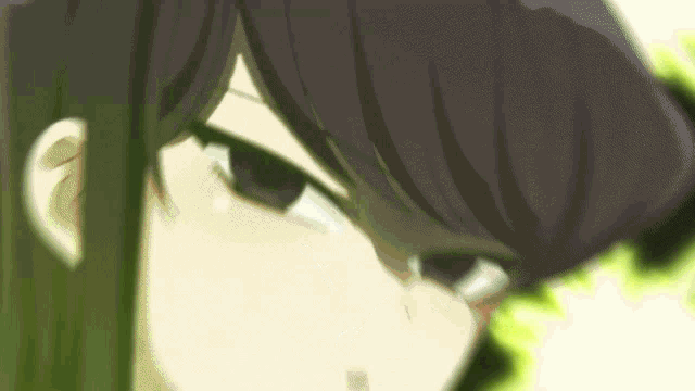 a close up of a girl 's face with a purple hair style