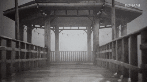 a black and white photo of a gazebo with konami written in the corner