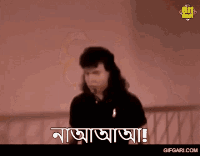 a man with blood on his face is making a funny face with a foreign language behind him