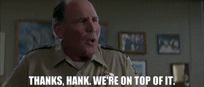 a man in a police uniform is saying thanks , hank we 're on top of it .