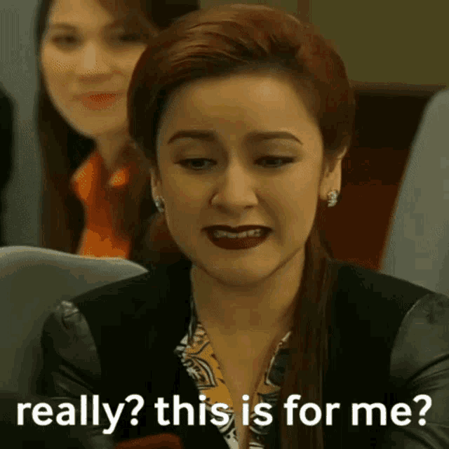 a woman says really this is for me in front of a group of women