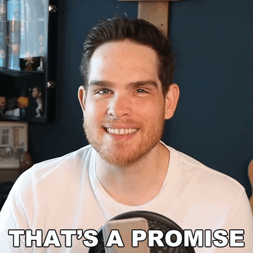 a man in a white shirt is smiling with the words that 's a promise behind him