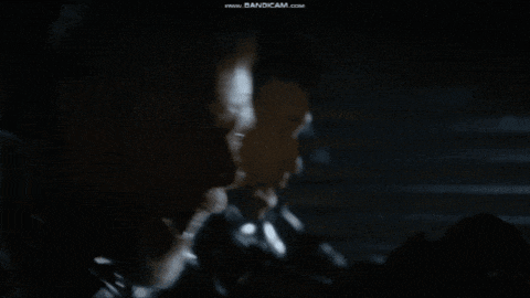 a close up of a man 's face with a bandcam.com watermark in the corner