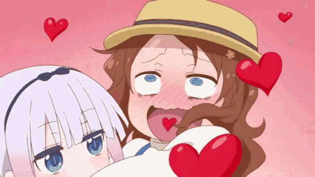 a girl with a hat is holding a red heart in her hand