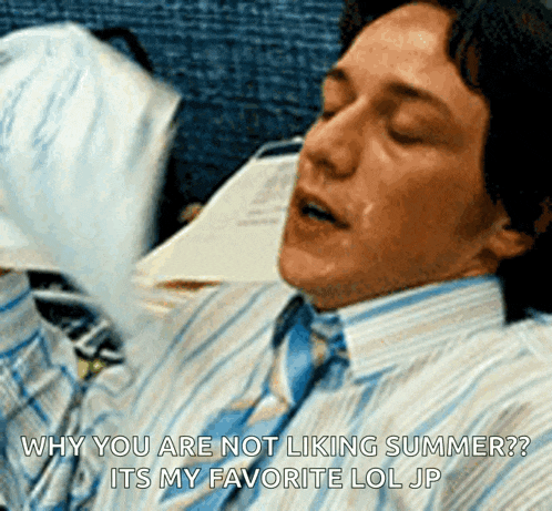 a man in a striped shirt and tie is laying down with his eyes closed and his mouth open