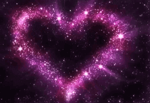 a heart shaped galaxy with purple and pink stars