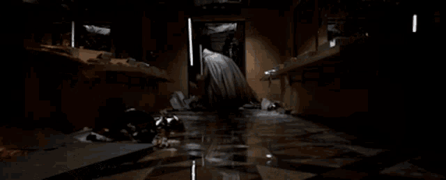 a person is crawling through a flooded bathroom in a movie scene