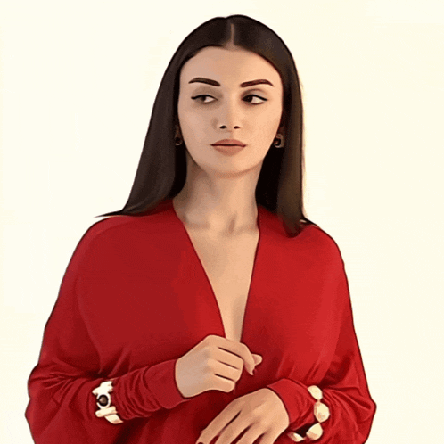 a woman in a red dress with a very plunging neckline