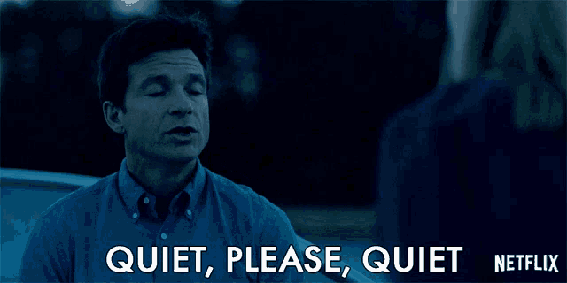 a man in a blue shirt says quiet please quiet on netflix