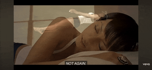 a video of a woman sleeping with the words not again on the bottom