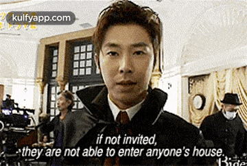a man in a suit and tie is saying `` if not invited , they are not able to enter anyone 's house