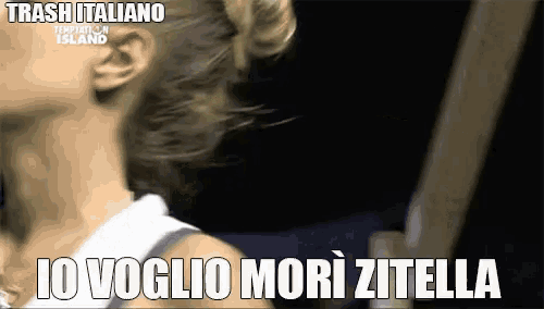 a close up of a woman 's neck with the words io voglio mori zitella written on it .