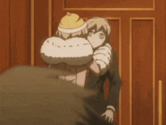 a couple of anime characters standing next to each other in a room .