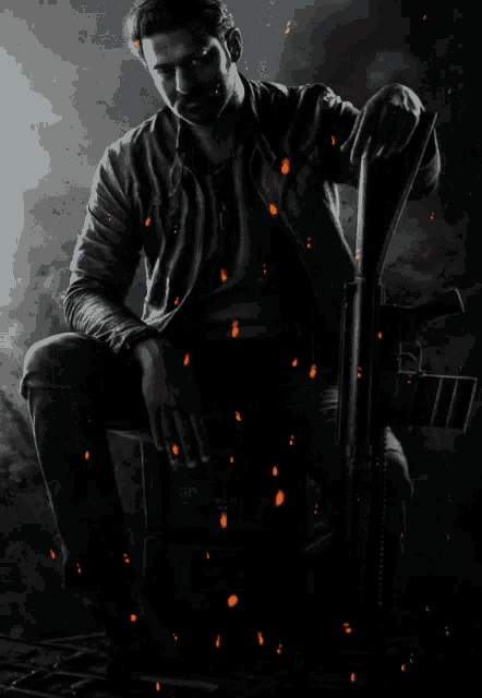 a man is sitting on a chair in a dark room with smoke coming out of it