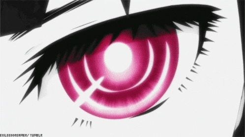 a close up of a person 's eye with a pink circle in the center