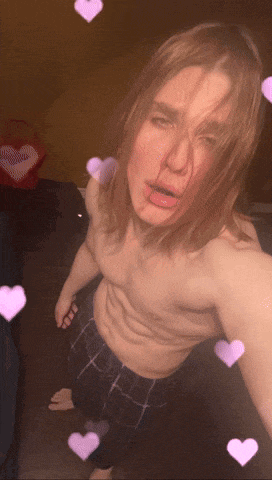 a man without a shirt is surrounded by hearts