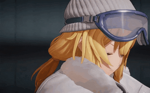 a girl wearing a white hat and goggles is looking down