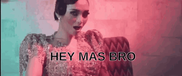 a woman in a dress is sitting on a couch with the words `` hey mas bro '' written above her .