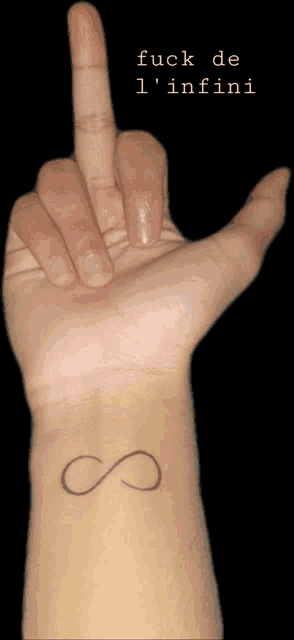 a hand with a tattoo of an infinity sign on it
