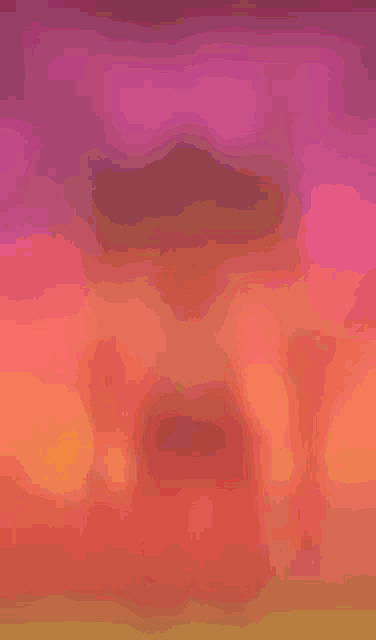 a sunset with a purple and orange gradient