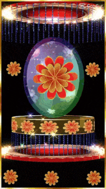 a display of flowers and a sphere with a flower inside