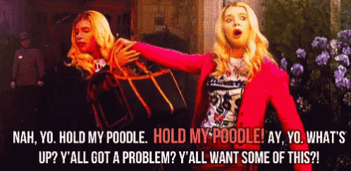 a woman in a red jacket is holding another woman 's arm and says " nah yo hold my poodle hold my poodle "