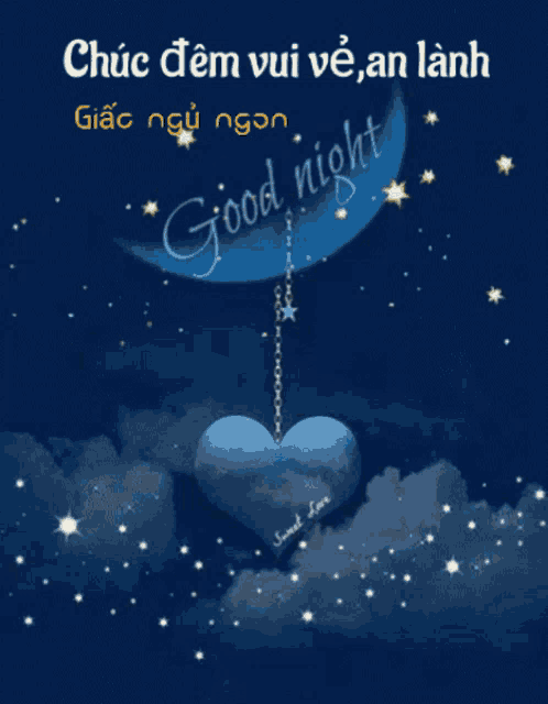 a picture of a heart hanging from a chain with the words good night written on it