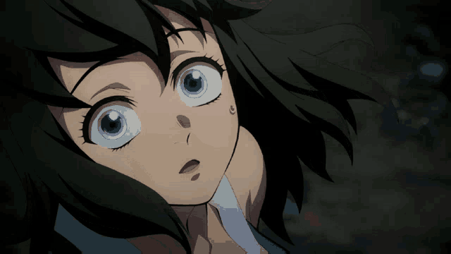 a close up of a girl 's face with green hair and blue eyes