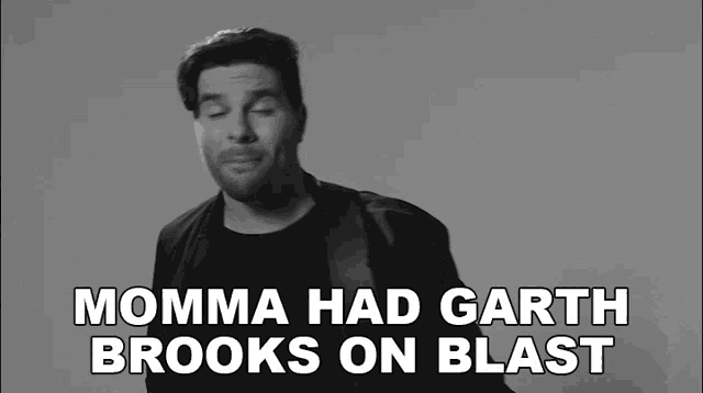a black and white photo of a man with the words momma had garth brooks on blast