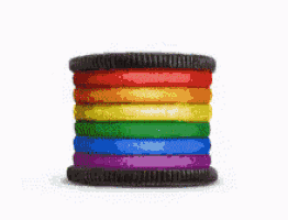 a stack of rainbow colored oreos with the words deal with it written below it