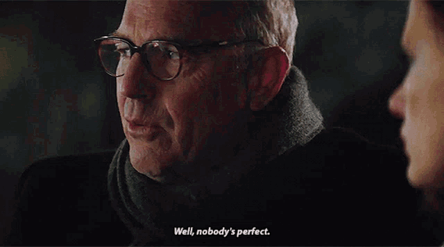 a man wearing glasses and a scarf says " well nobody 's perfect "