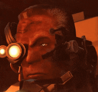 a man wearing a helmet with the word that 's on his face