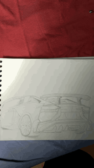 a black and white drawing of a sports car with the letter s on the side
