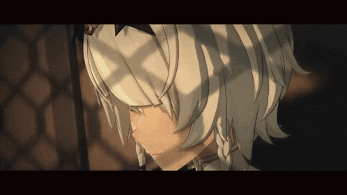 a close up of a person 's face with a shadow on it