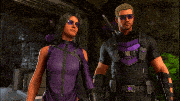 a man and a woman standing next to each other