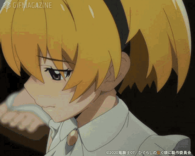 a close up of a girl 's face with a gifmagazine watermark