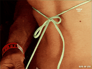 a gif of a woman 's stomach with the words gifs of aya visible